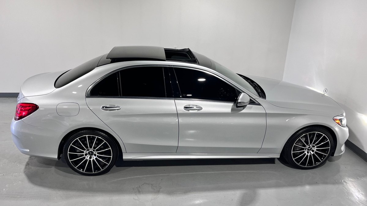 Silver Mercedes-Benz C-Class executive sedan